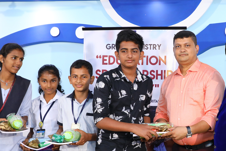 Grace Ministry, Bro Andrew Richard contributed 50 poor students free education scholarship at its centre on account of Christmas season in Mangalore here on Dec 15th, Sunday, 2019. 